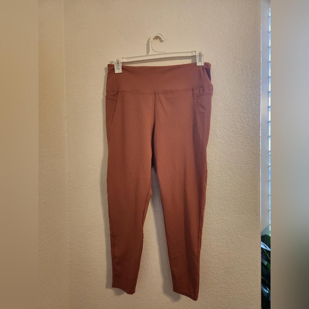 Danskin mauve colored leggings with pockets.NWOT Size XL